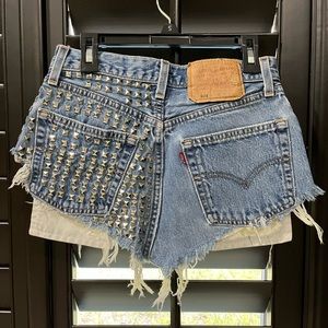 Custom made Levi’s cutoff shorts- hand studded festival style